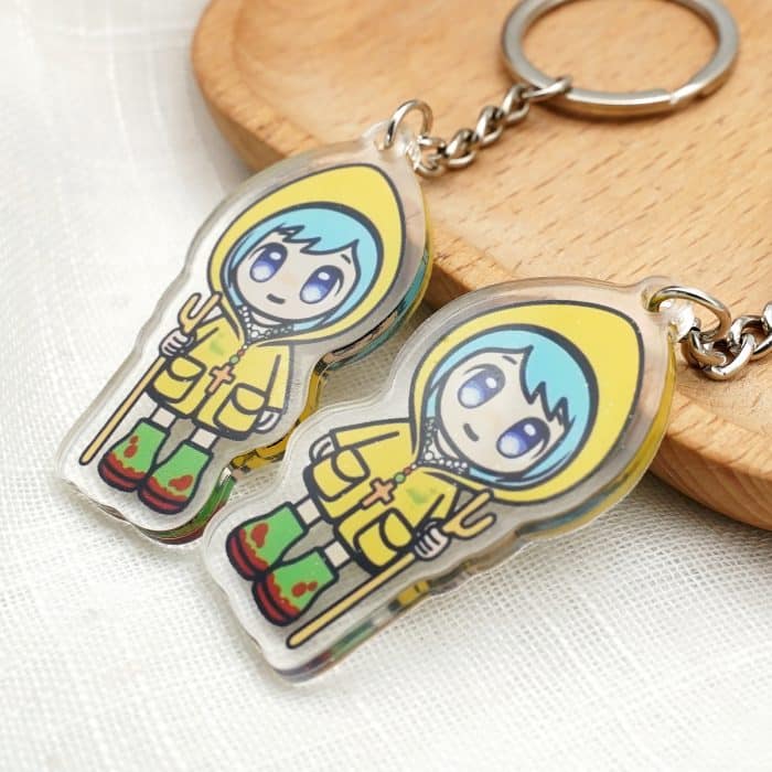 钥匙扣- 2025禧年-黄衣蓝发吉祥物-亚克力11cm Catholic religious art