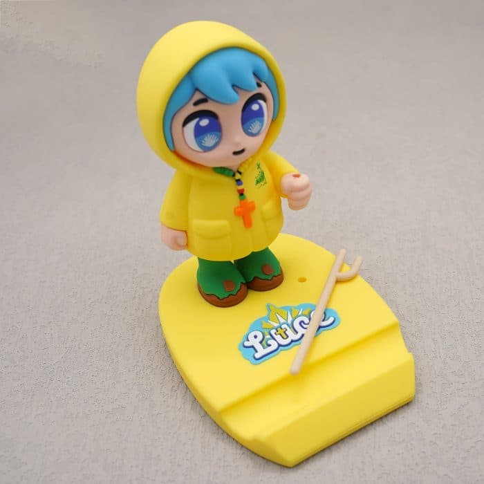 摆台-2025禧年-硅胶黄底手机支架-黄衣蓝发吉祥物-10cm Catholic religious art